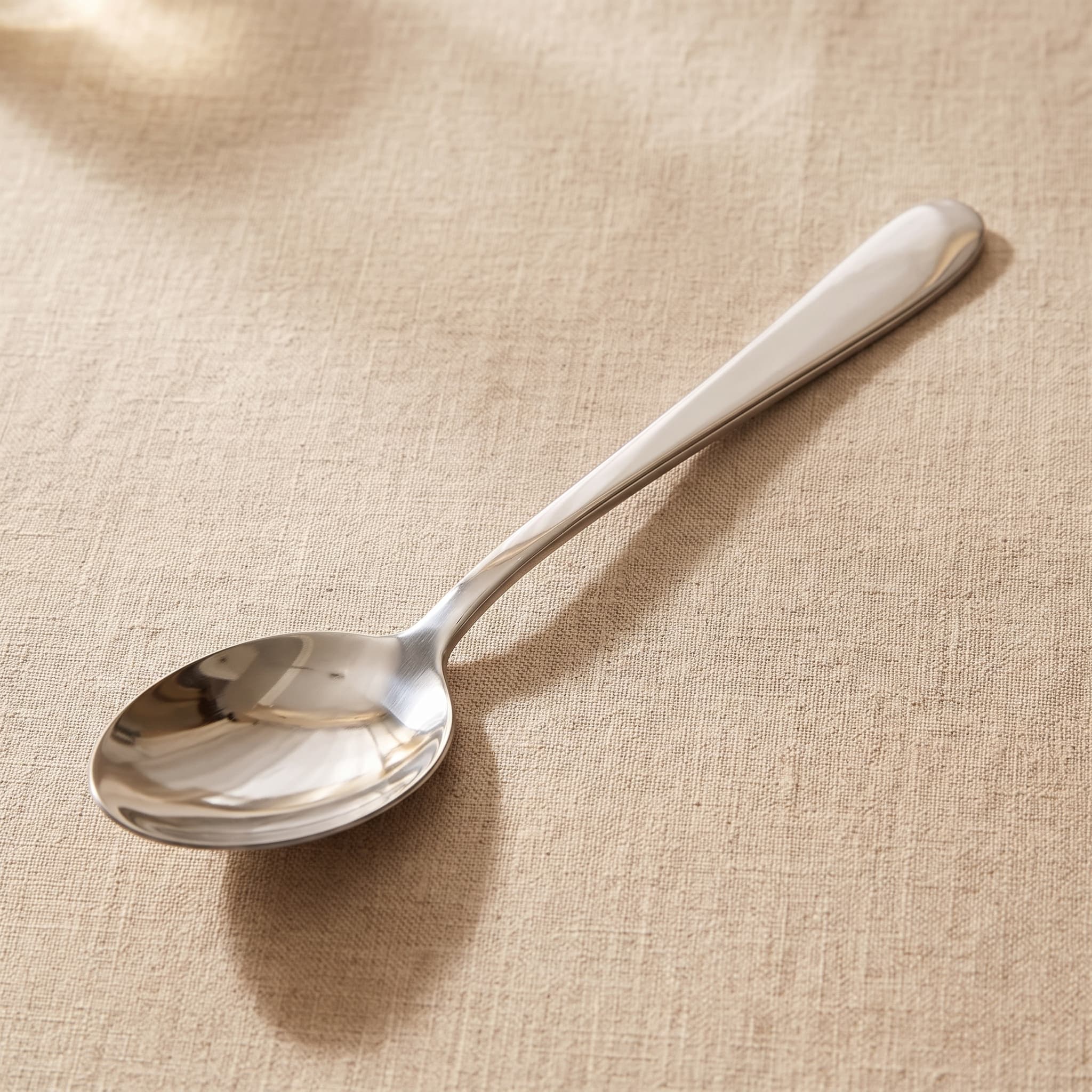 Service spoon hire London — Buckingham pattern stainless steel serving spoon for buffets, weddings and events